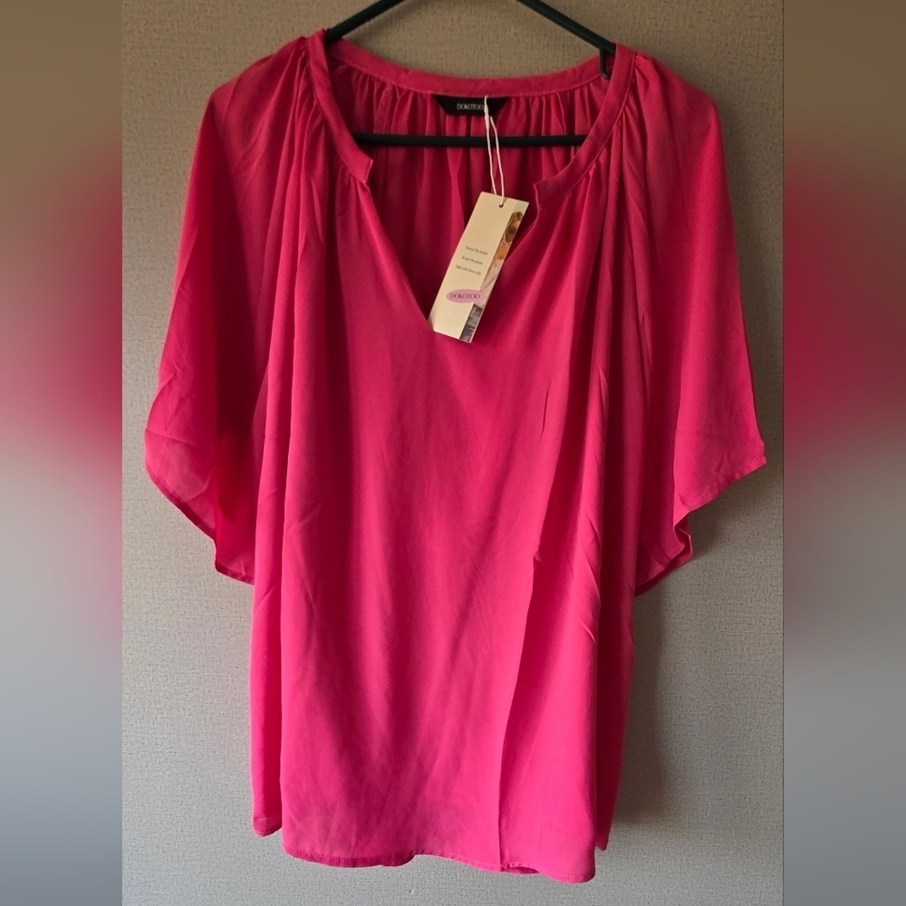 Elegant Fuchsia Blouse by [Brand]